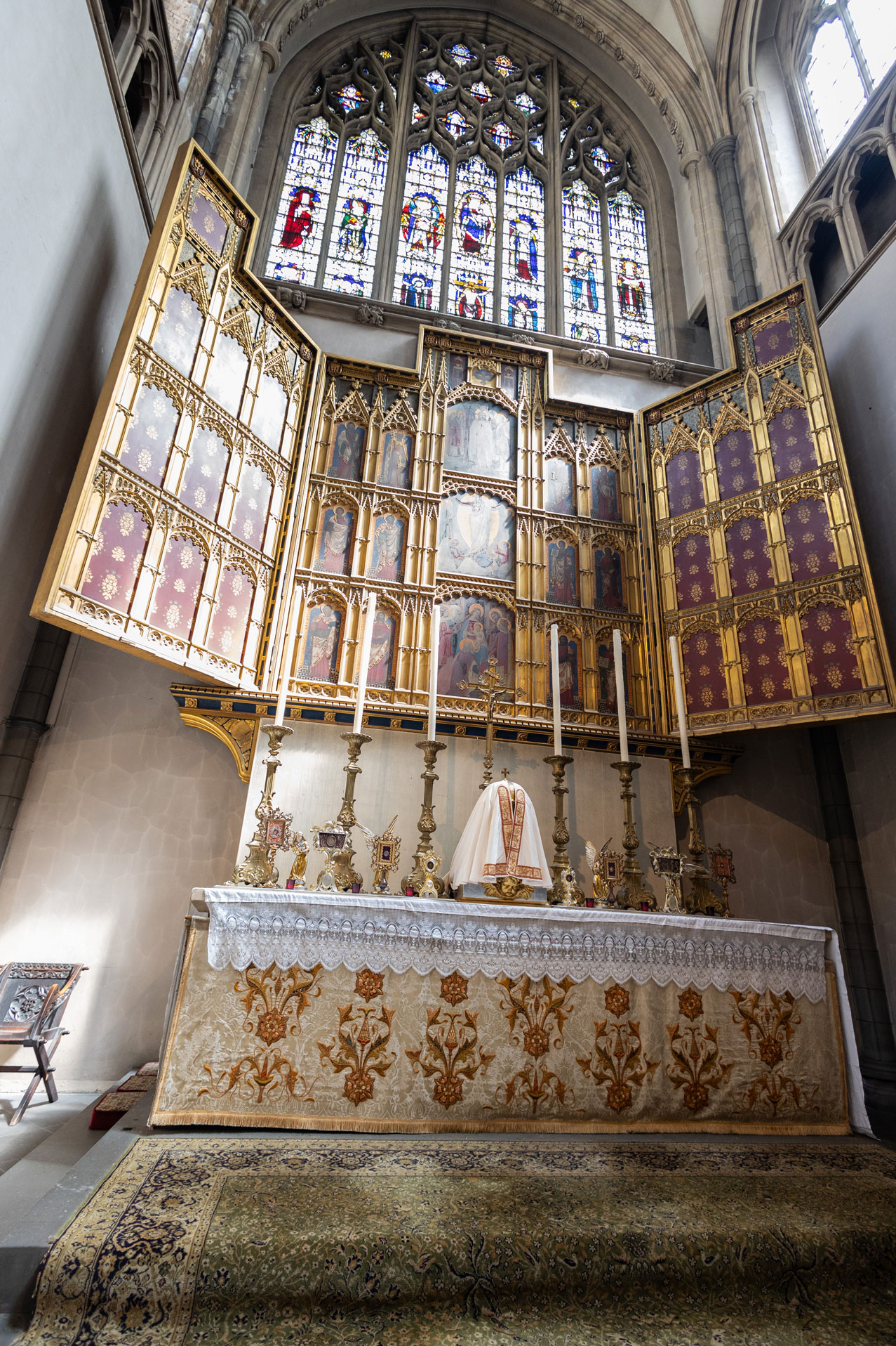 The richly decorated high altar and reredos at The Annunciation Marble Arch