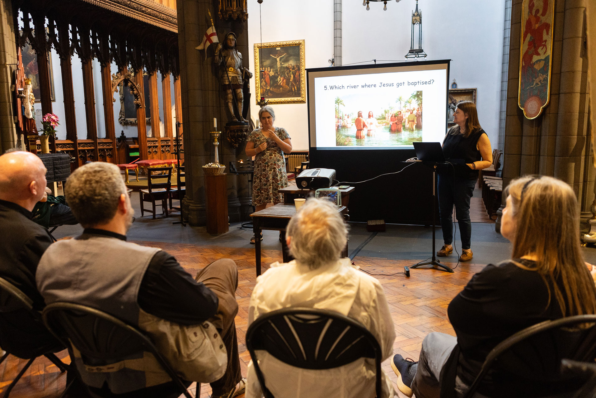 Church community members communicating during a Deaf ministry event